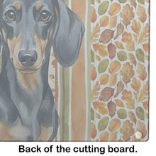 Load image into Gallery viewer, Black and Tan Dachshund Heirloom Fall Glass Cutting Board