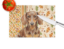 Load image into Gallery viewer, Chocolate and Tan Dachshund Heirloom Fall Glass Cutting Board