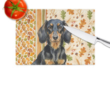 Load image into Gallery viewer, Longhaired Black and Tan Dachshund Heirloom Fall Glass Cutting Board