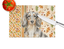 Load image into Gallery viewer, Longhaired Dapple Dachshund Heirloom Fall Glass Cutting Board