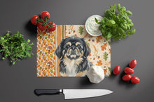 Load image into Gallery viewer, Black and Tan Pekingese Heirloom Fall Glass Cutting Board