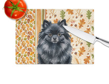 Load image into Gallery viewer, Black Pomeranian Heirloom Fall Glass Cutting Board