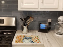 Load image into Gallery viewer, Blue Merle Pomeranian Heirloom Fall Glass Cutting Board
