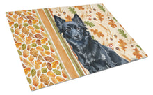 Load image into Gallery viewer, Schipperke Heirloom Fall Glass Cutting Board