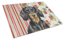 Load image into Gallery viewer, Longhaired Black and Tan Dachshund Vegetables Glass Cutting Board