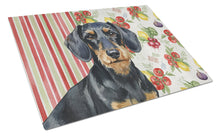 Load image into Gallery viewer, Wirehaired Black and Tan Dachshund Vegetables Glass Cutting Board