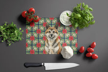 Load image into Gallery viewer, Brindle Akita Christmas PoinsettIas Glass Cutting Board