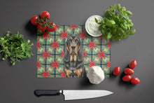 Load image into Gallery viewer, Black and Tan Bloodhound Christmas PoinsettIas Glass Cutting Board