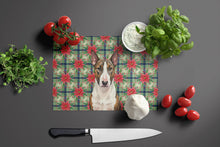 Load image into Gallery viewer, Brindle and White Bull Terrier Christmas PoinsettIas Glass Cutting Board