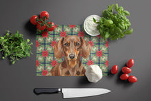 Load image into Gallery viewer, Chocolate and Tan Dachshund Christmas PoinsettIas Glass Cutting Board