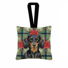 Load image into Gallery viewer, Longhaired Black and Tan Dachshund Christmas PoinsettIas Hanging Square Fabric Ornament 3.5 x 3.5