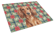 Load image into Gallery viewer, Longhaired Red Dachshund Christmas PoinsettIas Glass Cutting Board