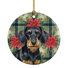 Load image into Gallery viewer, Wirehaired Black and Tan Dachshund Christmas PoinsettIas Ceramic Ornament