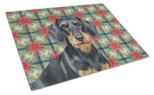 Load image into Gallery viewer, Wirehaired Black and Tan Dachshund Christmas PoinsettIas Glass Cutting Board