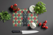 Load image into Gallery viewer, Black German Shepherd Christmas PoinsettIas Glass Cutting Board
