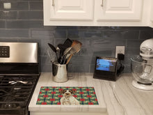 Load image into Gallery viewer, Liver and White German Wirehaired Pointer Christmas PoinsettIas Glass Cutting Board