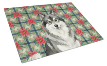 Load image into Gallery viewer, Keeshond Christmas PoinsettIas Glass Cutting Board