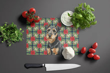 Load image into Gallery viewer, Black and Tan Lakeland Terrier Christmas PoinsettIas Glass Cutting Board