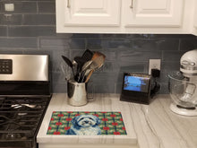 Load image into Gallery viewer, Blue and White Old English Sheepdog Christmas PoinsettIas Glass Cutting Board