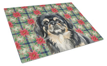 Load image into Gallery viewer, Black and Tan Pekingese Christmas PoinsettIas Glass Cutting Board