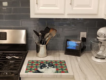 Load image into Gallery viewer, Black and White Pomeranian Christmas PoinsettIas Glass Cutting Board