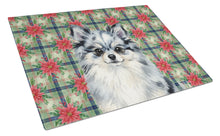 Load image into Gallery viewer, Blue Merle Pomeranian Christmas PoinsettIas Glass Cutting Board