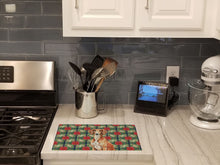 Load image into Gallery viewer, Red Saluki Christmas PoinsettIas Glass Cutting Board