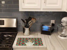 Load image into Gallery viewer, Sable Sheltie Christmas PoinsettIas Glass Cutting Board