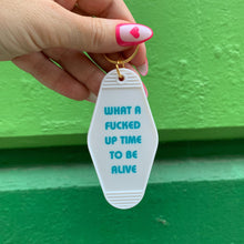 Load image into Gallery viewer, What a Fucked Up Time to Be Alive Motel Style Keychain in White