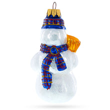 Load image into Gallery viewer, Snowman Wearing Blue Hat and Plaid Scarf with Broom Glass Christmas Ornament
