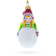 Load image into Gallery viewer, Girl Making a Snowball Glass Christmas Ornament