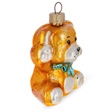 Load image into Gallery viewer, Golden Bear with Blue Bow and Raised Paws Glass Christmas Ornament