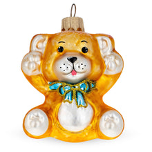 Load image into Gallery viewer, Golden Bear with Blue Bow and Raised Paws Glass Christmas Ornament