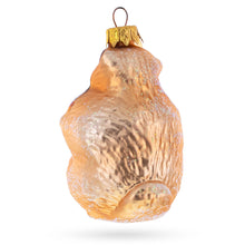 Load image into Gallery viewer, Otter Holding a Log Glass Christmas Ornament