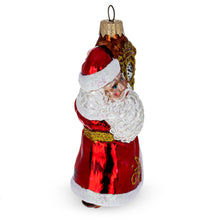 Load image into Gallery viewer, Santa Holding Grandfather Clock Glass Christmas Ornament