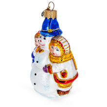 Load image into Gallery viewer, Kids Making Snowman Glass Christmas Ornament