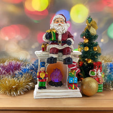 Load image into Gallery viewer, Santa Sitting on a Fireplace LED Lights Figurine 7.75 Inches