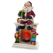 Load image into Gallery viewer, Santa Sitting on a Fireplace LED Lights Figurine 7.75 Inches