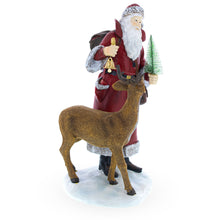 Load image into Gallery viewer, Santa Holding Christmas Tree and Bell by Reindeer Figurine 12 Inches