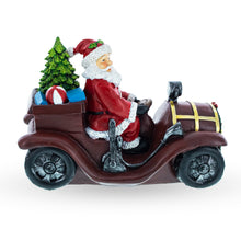 Load image into Gallery viewer, Santa Driving Classic Car with LED Lights Figurine 10.5 Inches Long