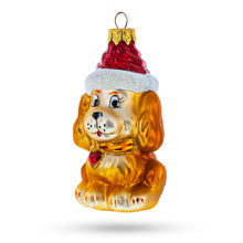 Load image into Gallery viewer, Golden Puppy in Red Santa Hat Glass Christmas Ornament