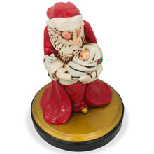 Load image into Gallery viewer, Santa Holding Newborn Figurine 6.5 Inches