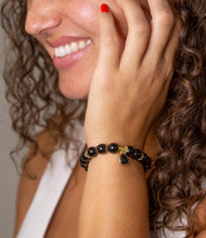 Load image into Gallery viewer, Black Onyx Gold Tone Beaded Stretch Bracelet