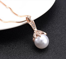 Load image into Gallery viewer, Crystal Flower &amp; Pearl Cremation Urn Necklace With Rhinestones
