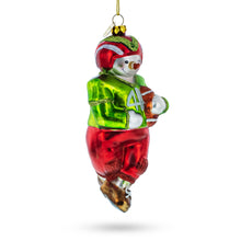 Load image into Gallery viewer, Snowman Playing Football Glass Christmas Ornament