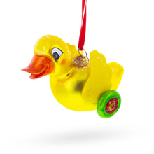 Load image into Gallery viewer, Yellow Duck Rolling on Wheels Glass Christmas Ornament