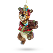 Load image into Gallery viewer, Bear Engaged in Football Glass Christmas Ornament