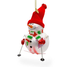 Load image into Gallery viewer, Snowman Skiing Glass Christmas Ornament