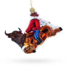 Load image into Gallery viewer, Cowboy Santa Riding Bull Western Rodeo Glass Christmas Ornament