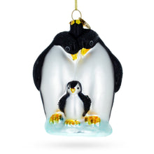 Load image into Gallery viewer, Penguins with Baby Chick Glass Christmas Ornament